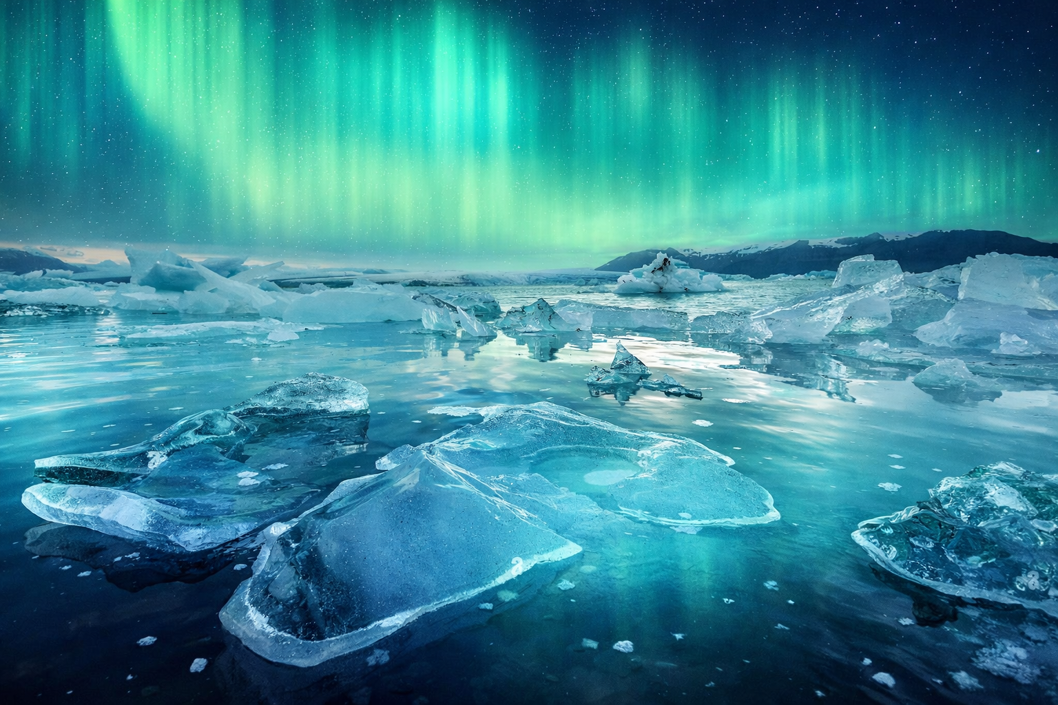 Traveler standing under purple and green northern lights in Iceland